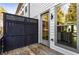 Private deck with a view of the backyard, featuring a wooden privacy fence at 207 Mitchell Ln, Woodstock, GA 30188