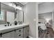 Double vanity bathroom with updated fixtures and a view of the main bedroom at 2699 Raven Ne Trl, Marietta, GA 30066