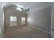 Bedroom with vaulted ceiling, fan, and window with shutters at 978 Kinghorn Nw Dr, Kennesaw, GA 30152