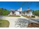 White community center with gray roof, covered porch, and gazebo at 414 Riverwood Dr, Dallas, GA 30157