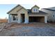 New construction home with a two car garage still under construction at 2036 Ripple Park Bnd, Canton, GA 30114