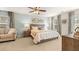 Spacious main bedroom with light walls and a ceiling fan at 279 Friendship Oak Way, Hampton, GA 30228