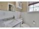 Bathroom with marble countertop and subway tile at 51 Peachtree Memorial Nw Dr # 4, Atlanta, GA 30309