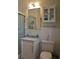 Bright bathroom with subway tile, updated vanity, and a large mirror at 51 Peachtree Memorial Nw Dr # 4, Atlanta, GA 30309