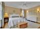 Spacious bedroom with hardwood floors and ceiling fan at 51 Peachtree Memorial Nw Dr # 4, Atlanta, GA 30309