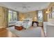 Spacious primary bedroom with hardwood floors and ample natural light at 51 Peachtree Memorial Nw Dr # 4, Atlanta, GA 30309