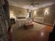 Bright bedroom with a queen-size bed, dresser, and hardwood floors at 51 Peachtree Memorial Nw Dr # 4, Atlanta, GA 30309