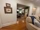 View into dining room with hardwood floors and a charming table setting at 51 Peachtree Memorial Nw Dr # 4, Atlanta, GA 30309