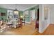 Spacious dining room with green walls and hardwood floors at 51 Peachtree Memorial Nw Dr # 4, Atlanta, GA 30309