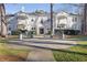 Elegant brick building with a courtyard and benches, offering a welcoming entrance at 51 Peachtree Memorial Nw Dr # 4, Atlanta, GA 30309