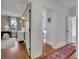 Bright hallway with hardwood floors and access to bedrooms at 51 Peachtree Memorial Nw Dr # 4, Atlanta, GA 30309