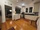 Bright kitchen featuring white cabinetry and hardwood floors at 51 Peachtree Memorial Nw Dr # 4, Atlanta, GA 30309