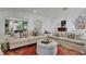 Spacious living room with two sofas, ottoman, and decorative accents at 51 Peachtree Memorial Nw Dr # 4, Atlanta, GA 30309