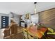 Eat-in kitchen with stainless steel appliances and a sliding barn door to the bedroom at 883 Verona Dr, Clarkston, GA 30021