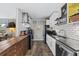 Efficient kitchen design with subway tile, stainless steel appliances, and lots of storage at 883 Verona Dr, Clarkston, GA 30021