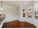 Elegant dining area with hardwood floors and bay window at 1504 Everson Walk, Hampton, GA 30228