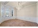 Formal dining room with bay window and chandelier at 1504 Everson Walk, Hampton, GA 30228