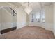 Formal dining room with bay window and chandelier at 1504 Everson Walk, Hampton, GA 30228