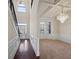 Two-story foyer with hardwood floors and chandelier at 1504 Everson Walk, Hampton, GA 30228