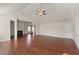 Open living room with hardwood floors and high ceilings at 1504 Everson Walk, Hampton, GA 30228