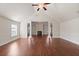 Spacious living room, hardwood floors, high ceiling, fireplace at 1504 Everson Walk, Hampton, GA 30228