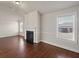 Living room with fireplace and hardwood floors at 1504 Everson Walk, Hampton, GA 30228