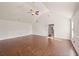 Large main bedroom with hardwood floors and access to bathroom at 1504 Everson Walk, Hampton, GA 30228