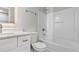 Modern bathroom with white vanity and tub at 2793 Keystone Ave, Lithonia, GA 30058