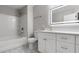 Modern bathroom with white vanity and marble floors at 2793 Keystone Ave, Lithonia, GA 30058