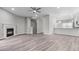 Open living room with fireplace and hardwood floors at 2793 Keystone Ave, Lithonia, GA 30058