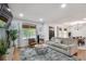 Open living room and dining area with hardwood floors at 3839 Redbud Se Ct, Smyrna, GA 30082