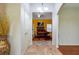 Hallway with tile floor and views into living room and game room at 4050 Old Fairburn Rd, Atlanta, GA 30349