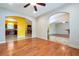 Open living space with hardwood floors and views to kitchen and other rooms at 4050 Old Fairburn Rd, Atlanta, GA 30349