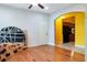 Living room with hardwood floors and access to kitchen at 4050 Old Fairburn Rd, Atlanta, GA 30349