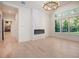 Bright living room with hardwood floors and marble fireplace at 427 Jon Scott Dr, Alpharetta, GA 30009