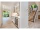 Modern wet bar with quartz countertops and wine cooler at 427 Jon Scott Dr, Alpharetta, GA 30009