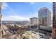 High-rise view featuring a stunning cityscape of modern buildings, trees, and a bright blue sky at 620 Peachtree Ne St # 1412, Atlanta, GA 30308