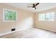 Bedroom with light walls, wood flooring and ceiling fan at 2435 Claude Nw St, Atlanta, GA 30318