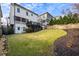 Landscaped backyard with a sloped lawn at 2603 Apple Valley Ne Rd, Brookhaven, GA 30319