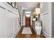 Bright entryway with hardwood floors and built in shelving at 2603 Apple Valley Ne Rd, Brookhaven, GA 30319