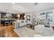 Spacious living room with hardwood floors, fireplace and large windows at 2603 Apple Valley Ne Rd, Brookhaven, GA 30319