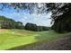 Rolling green hills of a beautiful golf course at 308 Hillpine Dr, Woodstock, GA 30189