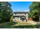 Two story house with backyard, deck and privacy fence at 12 Spruce Ne St, White, GA 30184