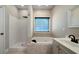 Bathroom with soaking tub, shower, and single vanity at 12 Spruce Ne St, White, GA 30184