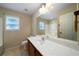 Simple bathroom with single vanity and bathtub at 12 Spruce Ne St, White, GA 30184