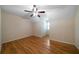 Bedroom with hardwood floors and ceiling fan at 12 Spruce Ne St, White, GA 30184