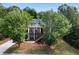 Two story house with stone accents and wooden deck at 12 Spruce Ne St, White, GA 30184