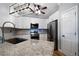 Modern kitchen with stainless steel appliances and granite countertops at 12 Spruce Ne St, White, GA 30184