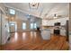 Open concept kitchen with island and stainless steel appliances at 12 Spruce Ne St, White, GA 30184