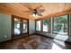 Sunroom with tiled floor, ceiling fan, and French doors at 12 Spruce Ne St, White, GA 30184